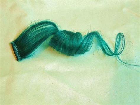 teal hair clip in extensions|More.